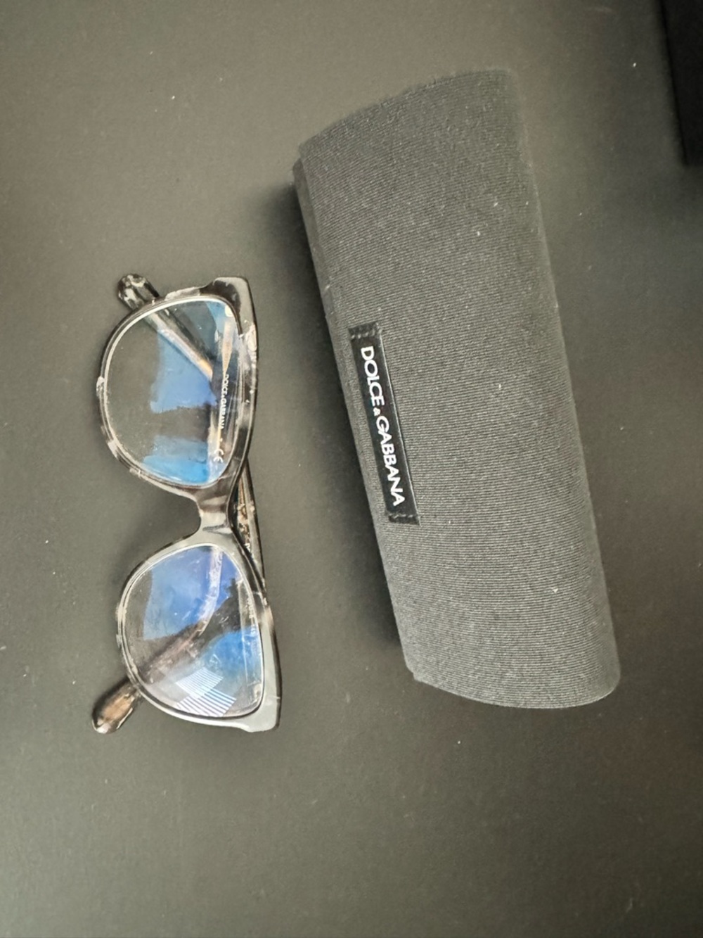 Dolce & Gabbana Black Frames with Blue-Tinted Lenses Women’s Glasses